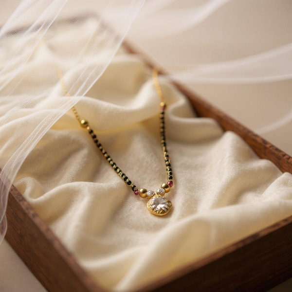 Designer Mangalsutra with Gold-Plated Pendant & Black Beads Chain