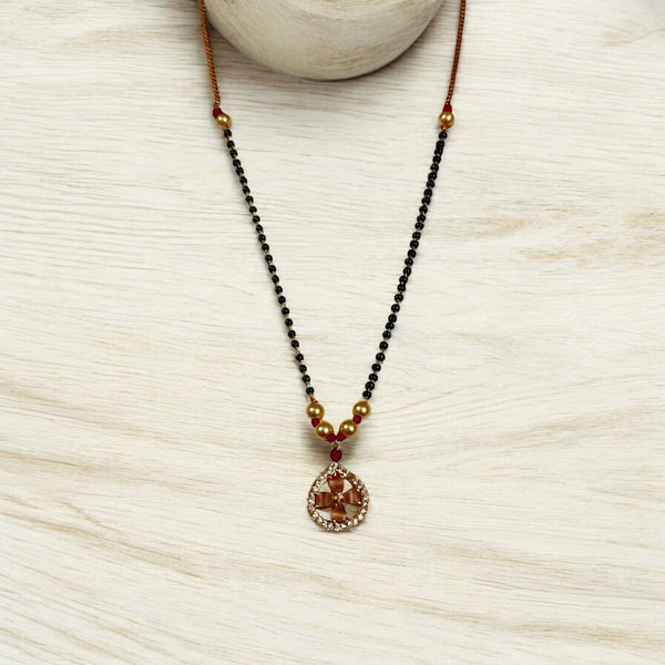 Designer Black Bead Mangalsutra with Gold Pearl Accents For Women